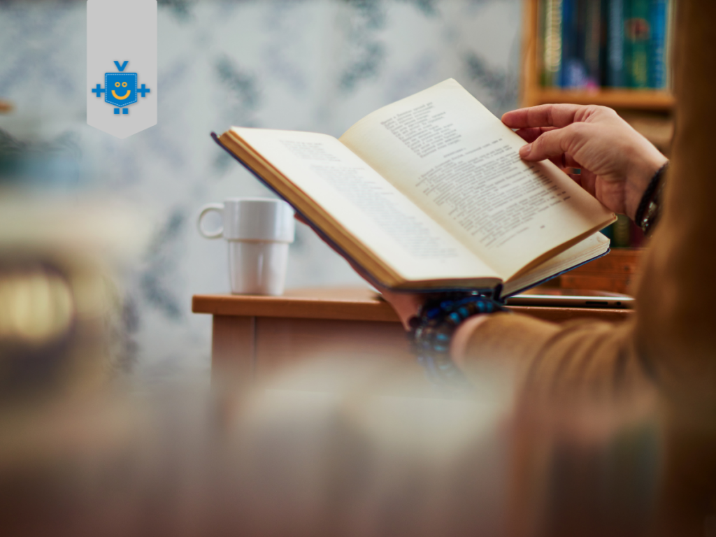 Pessoa lendo livro de finanças.